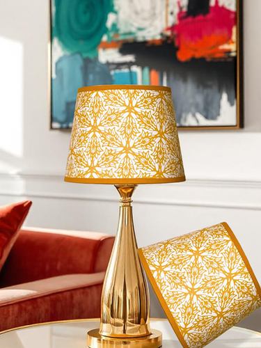 Moji Salehi’s Odyssey Collection of hand-printed home and lifestyle products, including cushions, lampshades, wallpaper, gift wraps, notebooks, and silk scarves, featuring intricate patterns inspired by Persian heritage and contemporary design.