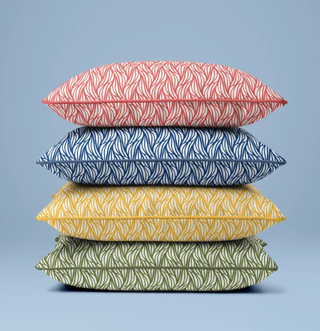 Moji Salehi’s Odyssey Collection of hand-printed home and lifestyle products, including cushions, lampshades, wallpaper, gift wraps, notebooks, and silk scarves, featuring intricate patterns inspired by Persian heritage and contemporary design.