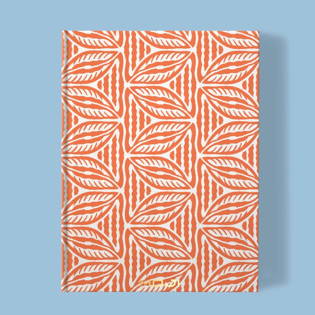 Hand-printed orange Cottage Leaves notebook, organic fabric