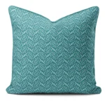 Hand-printed teal seed pod cushion, organic fabric